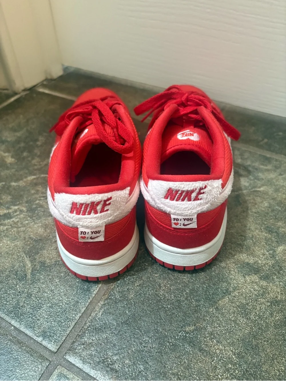 Nike Kids Red Low-Top Sneakers with White Swoosh Accent